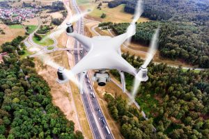 Hovering,Drone,Taking,Pictures,Of,Highway,In,Forest,,Netherlands